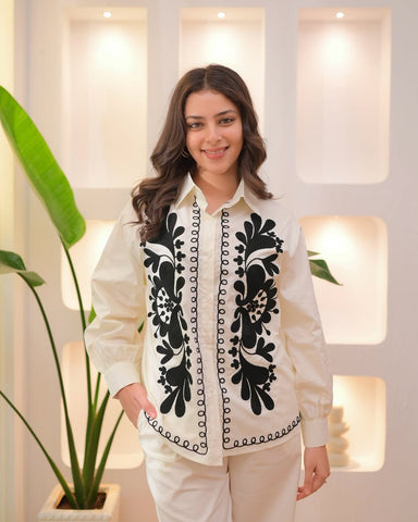 Ivory Ensemble with Bold Black Embroidery