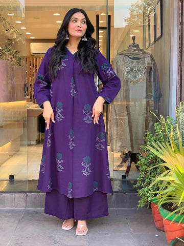 Elegant Plum Kurta Set with Floral Motifs